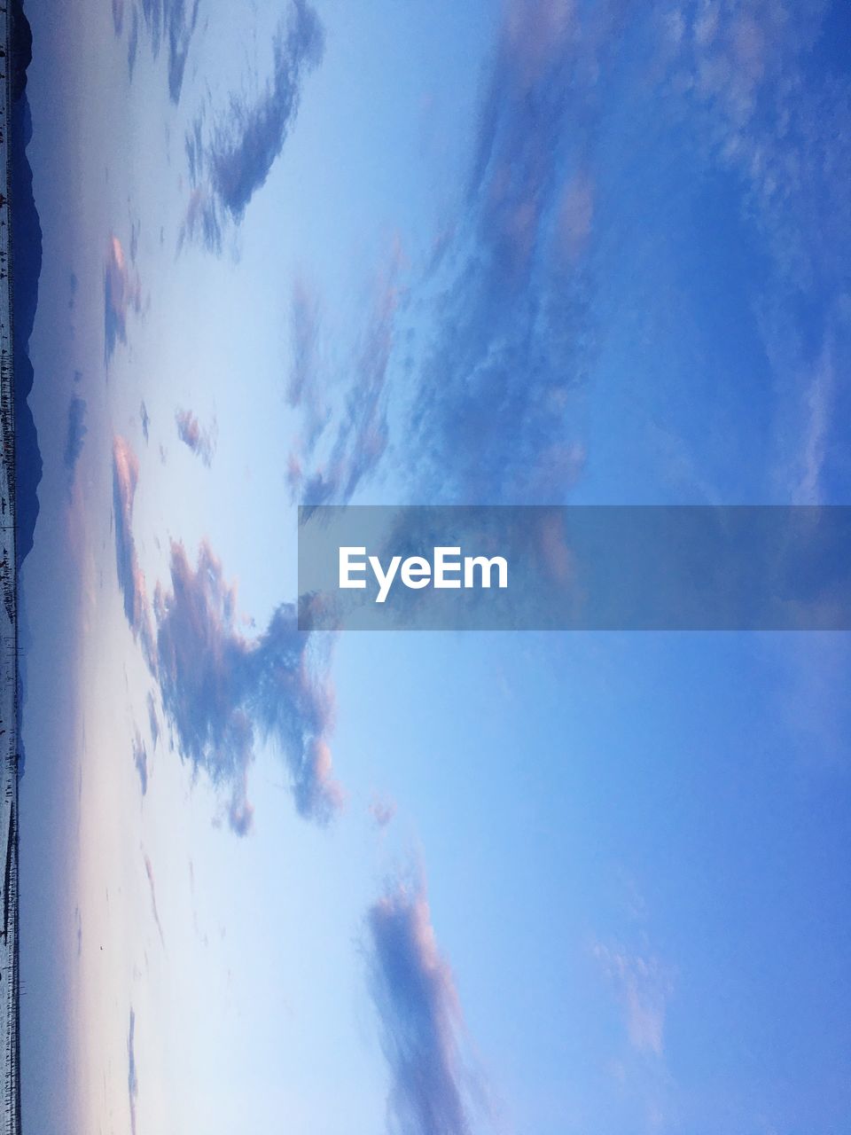 LOW ANGLE VIEW OF CLOUDS IN BLUE SKY