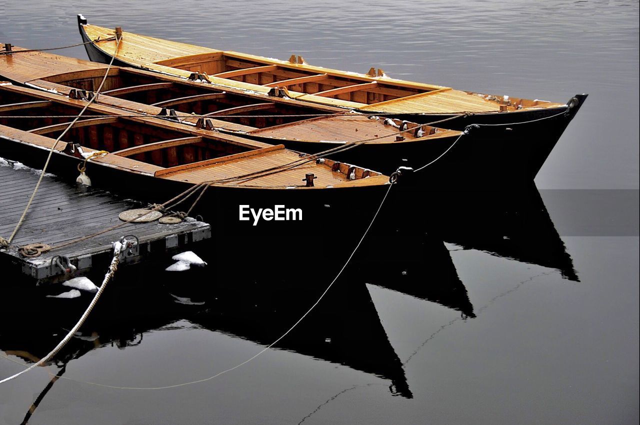 Boat moored in water