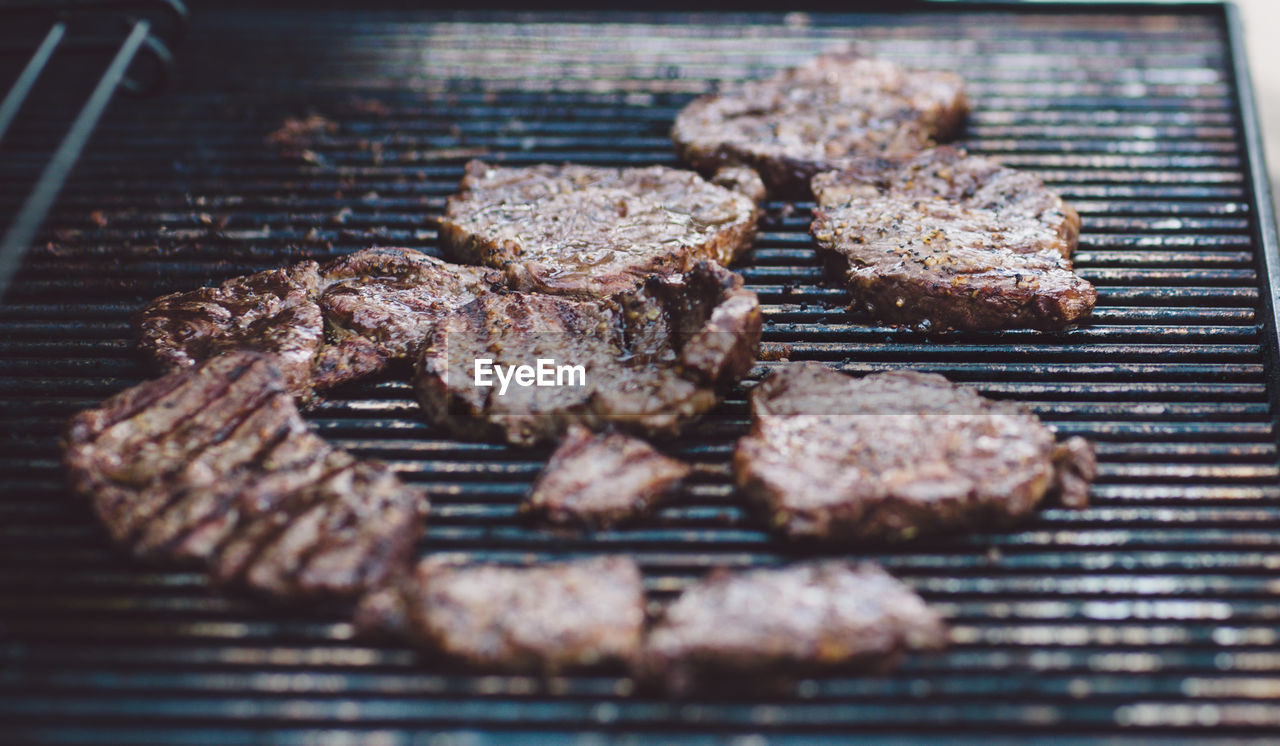 Close-up of meat on barbecue grill