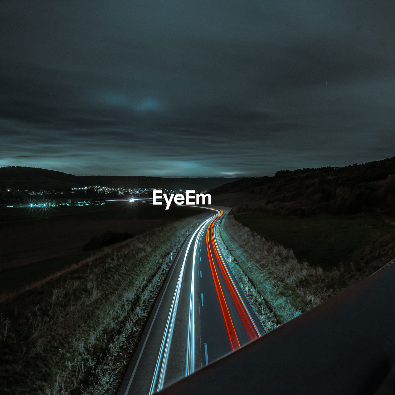 LIGHT TRAILS ON HIGHWAY