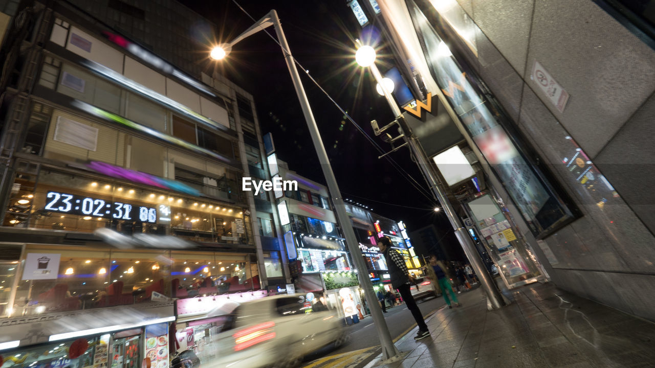 CITY STREET AT NIGHT