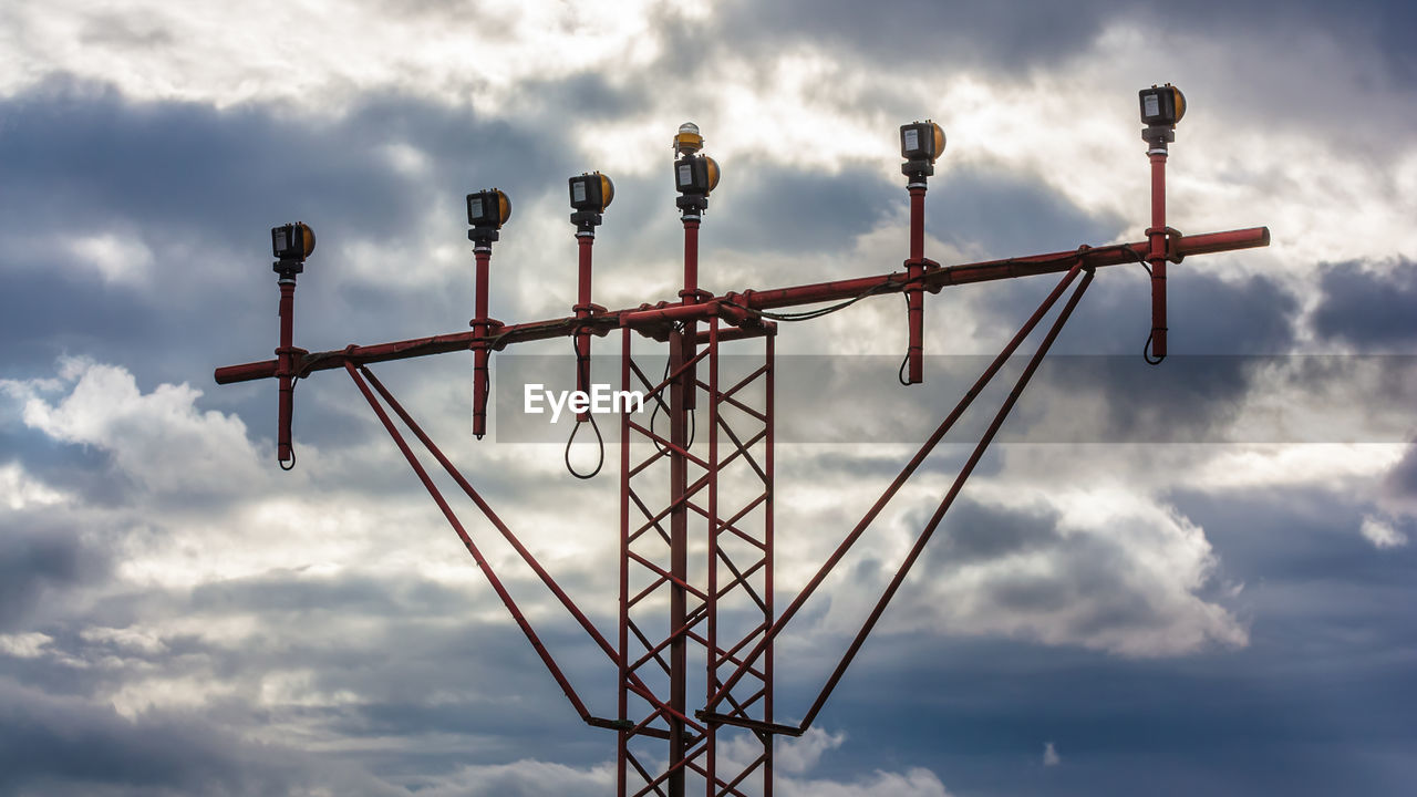 LOW ANGLE VIEW OF SILHOUETTE METAL AGAINST SKY