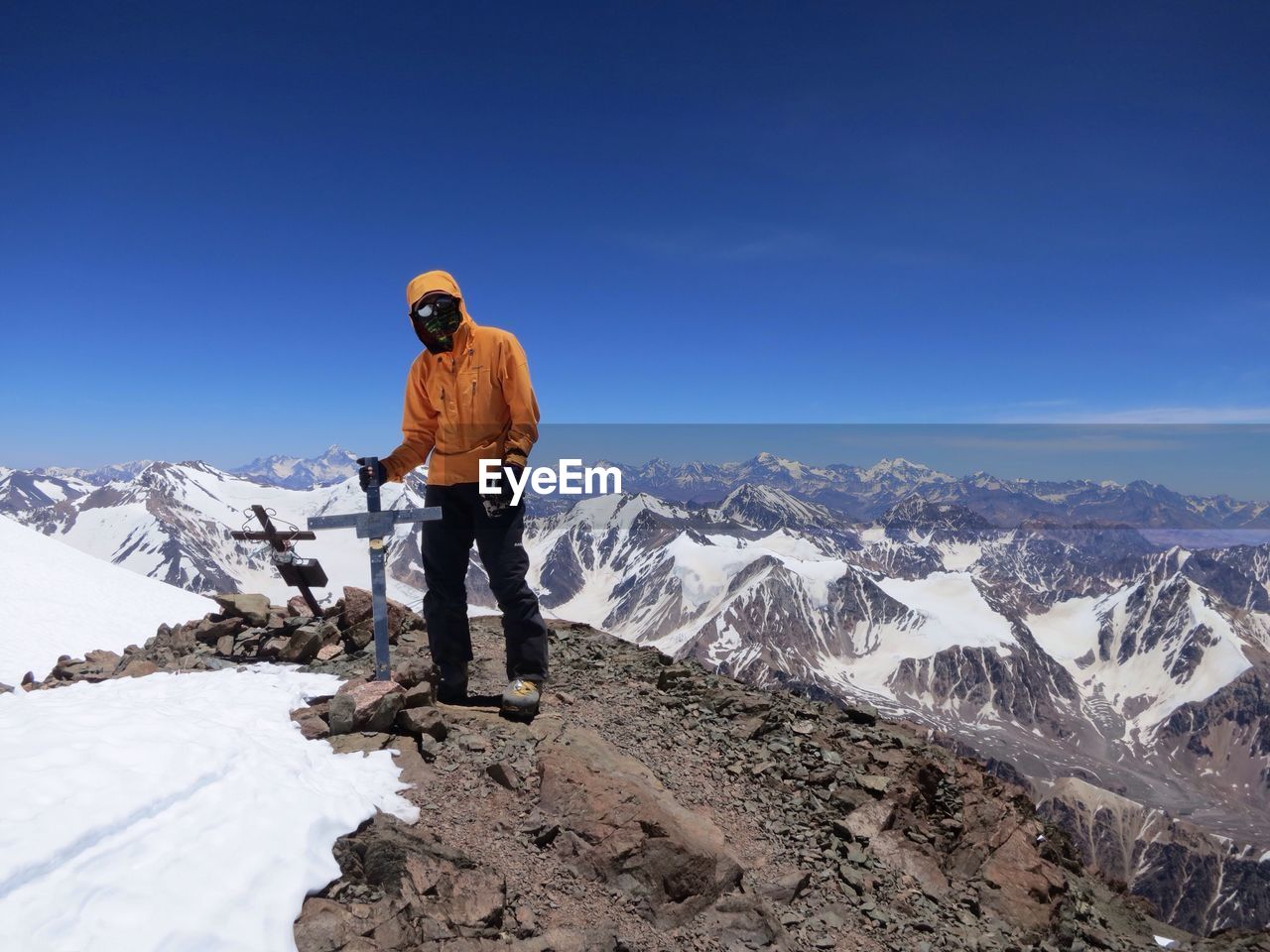 Man standing on mountain peak
