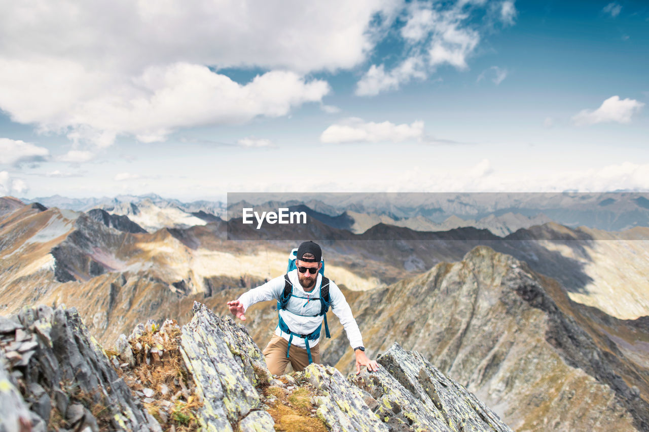 Man in the mountain wilderness on the italian alps