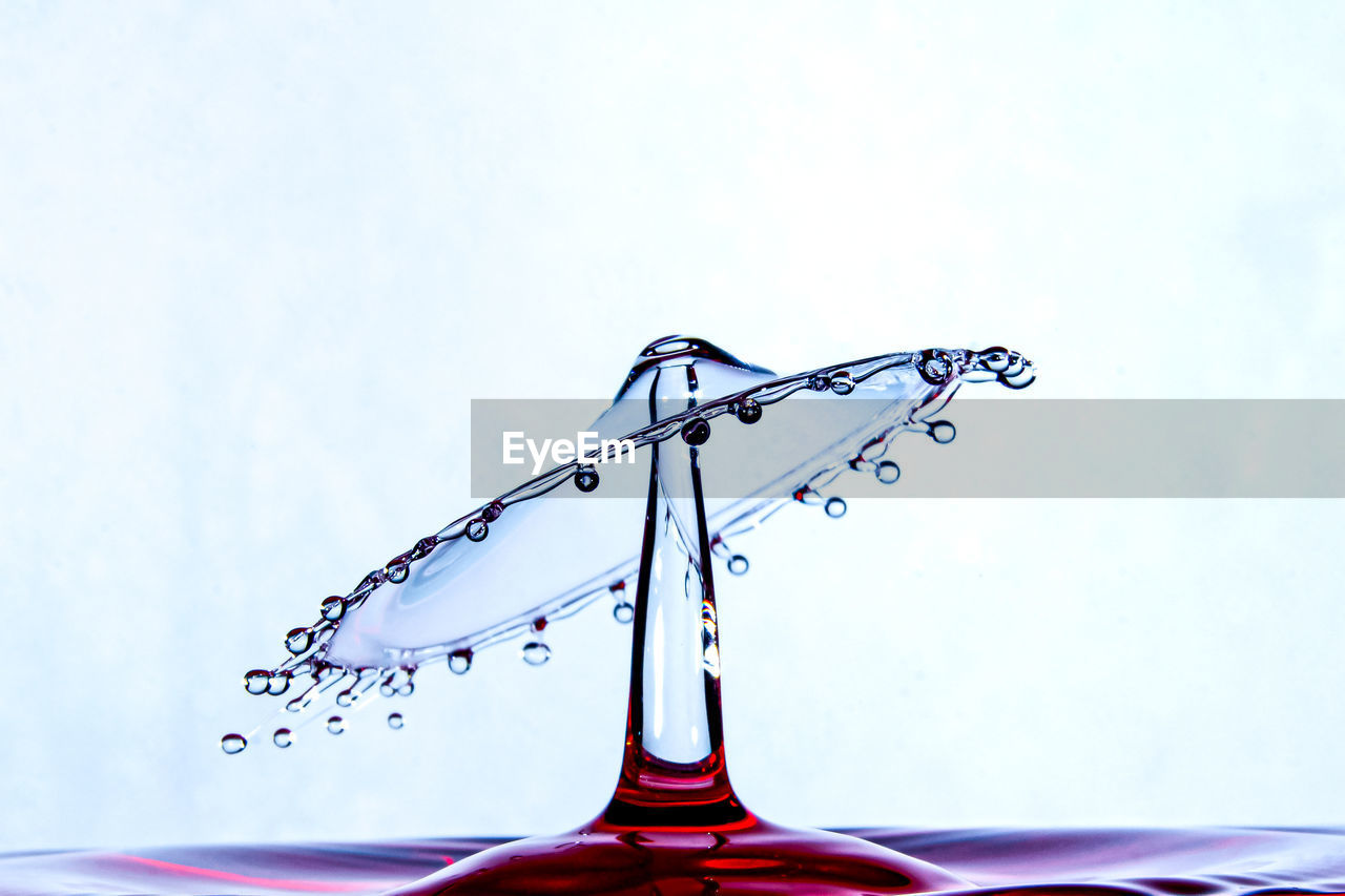 CLOSE-UP OF WATER DROPS ON GLASS