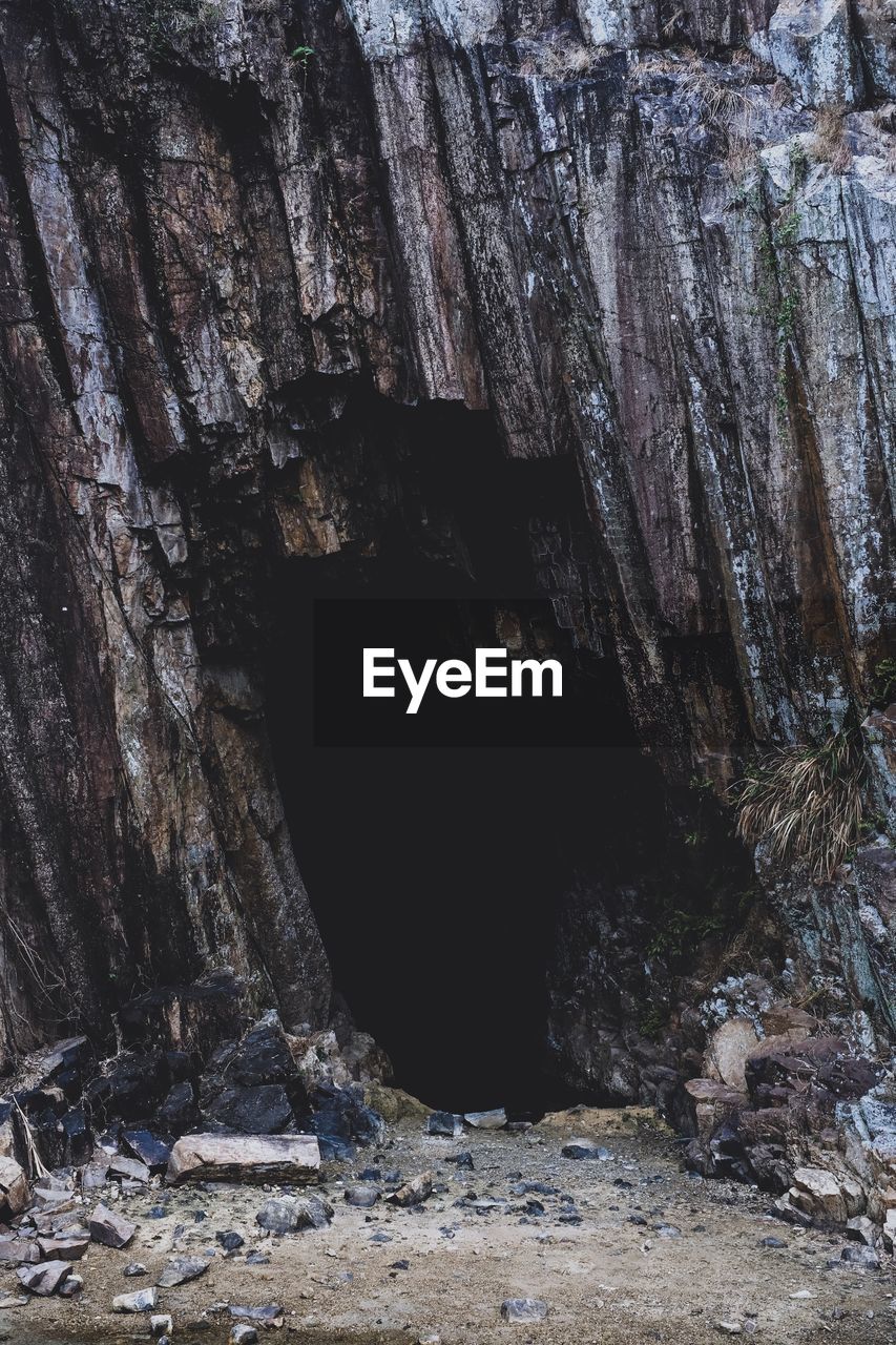 cave, rock, nature, no people, land, rock formation, beauty in nature, tree, geology, non-urban scene, day, formation, outdoors, environment, tranquility, scenics - nature, forest, plant, water, landscape