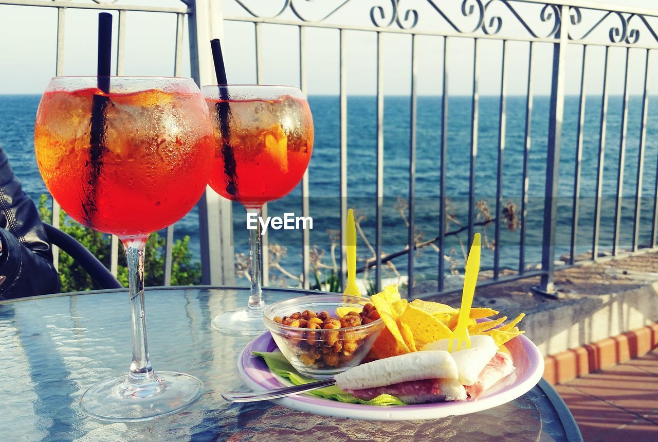 CLOSE-UP OF DRINK ON TABLE