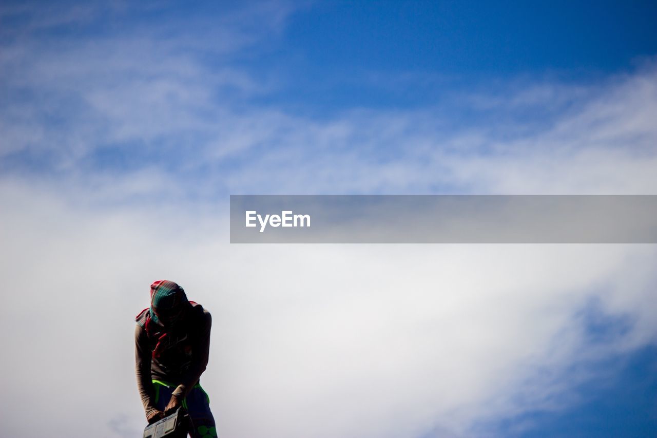 Man standing against sky