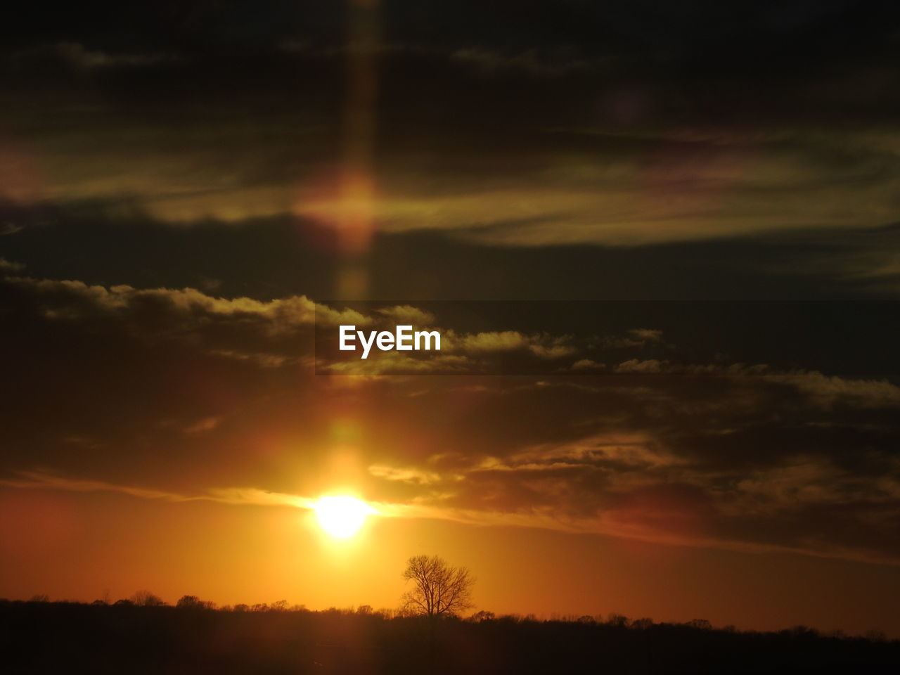 SCENIC VIEW OF SILHOUETTE LANDSCAPE AGAINST SUNSET SKY