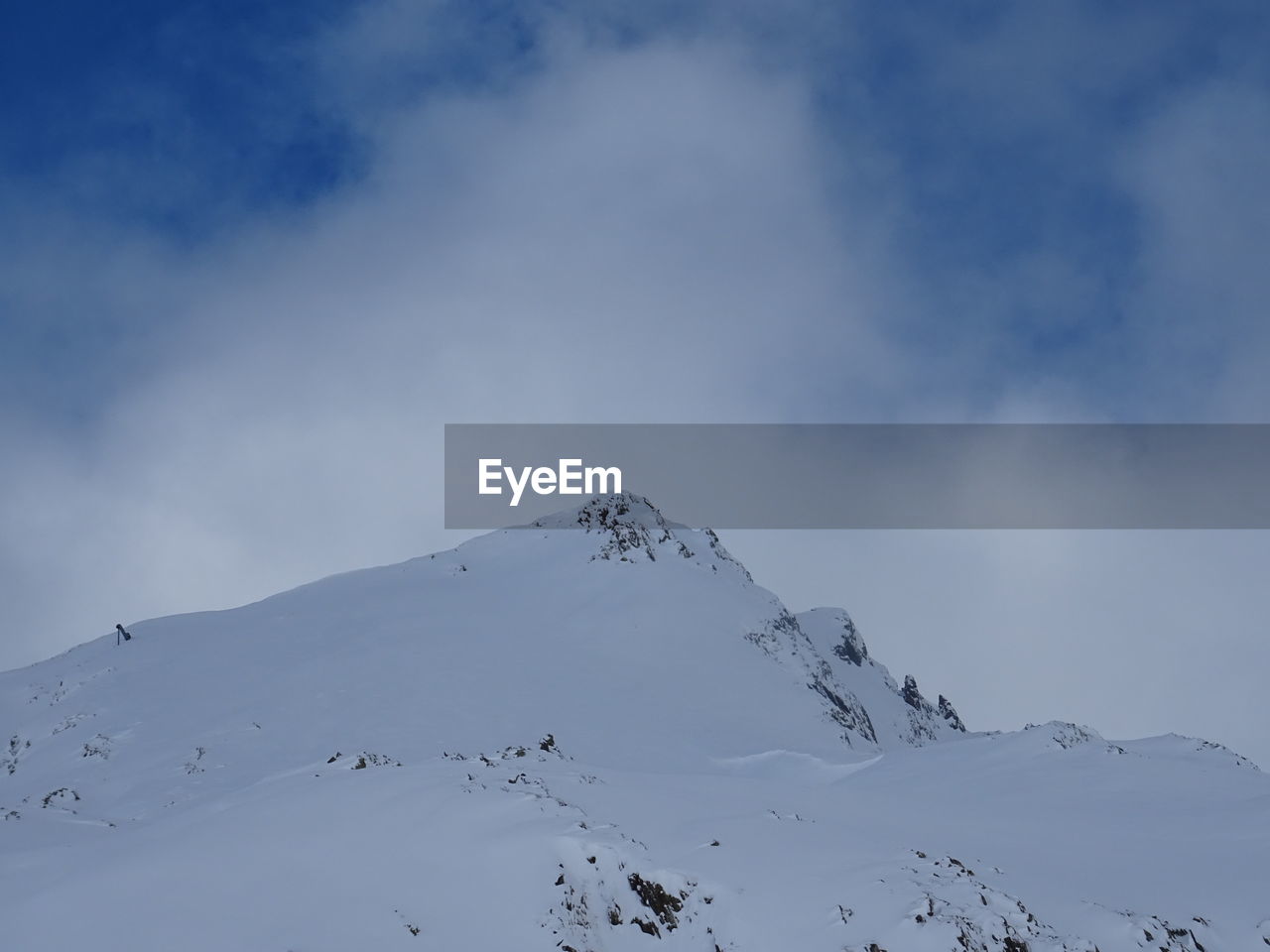 LOW ANGLE VIEW OF SNOW AGAINST SKY