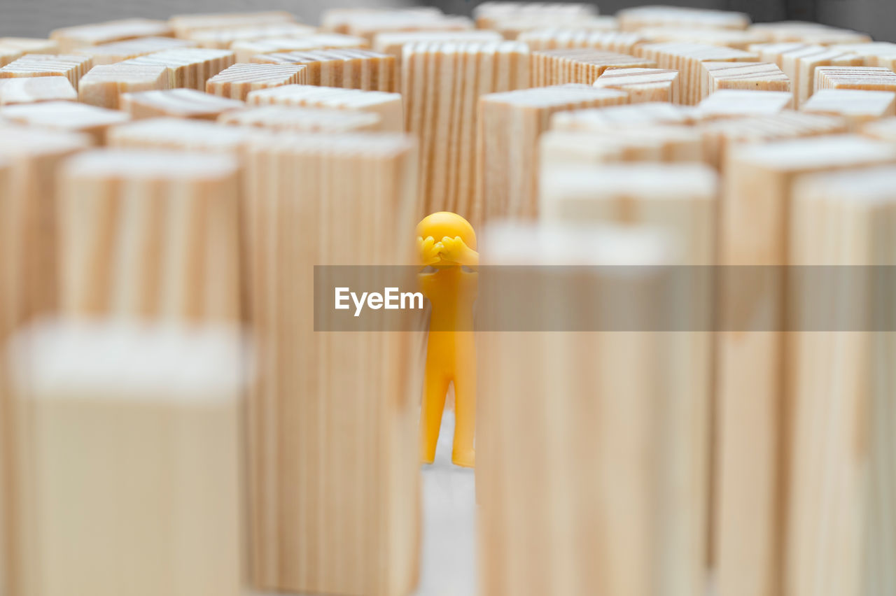 CLOSE-UP OF YELLOW TOYS ON TABLE