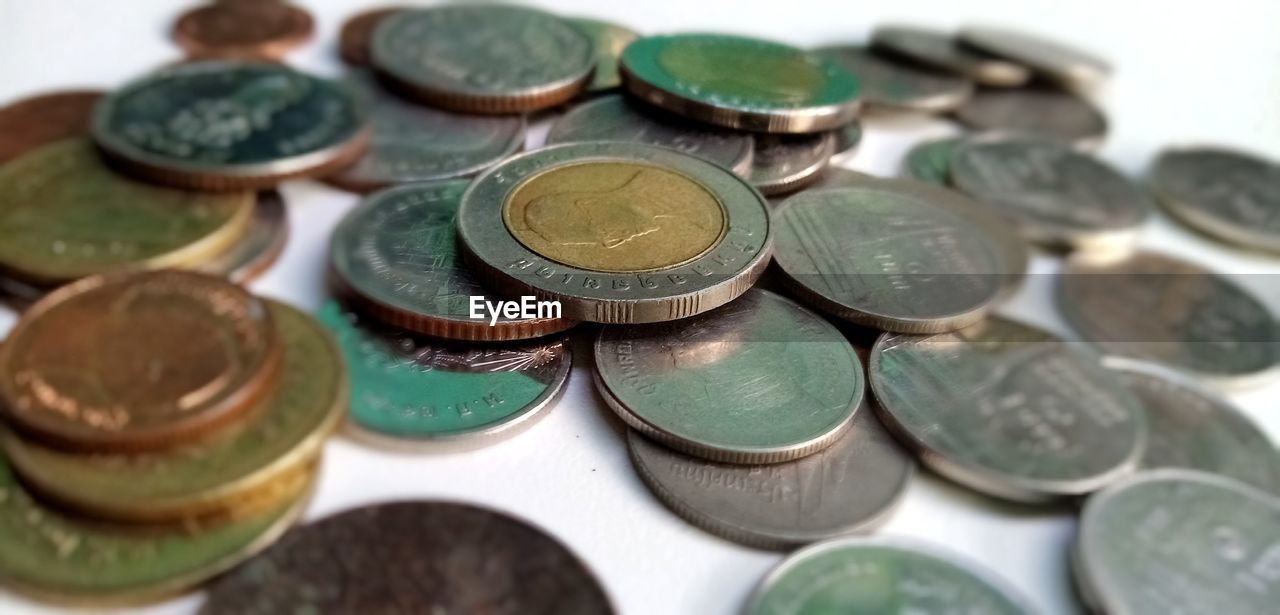 High angle view of coins