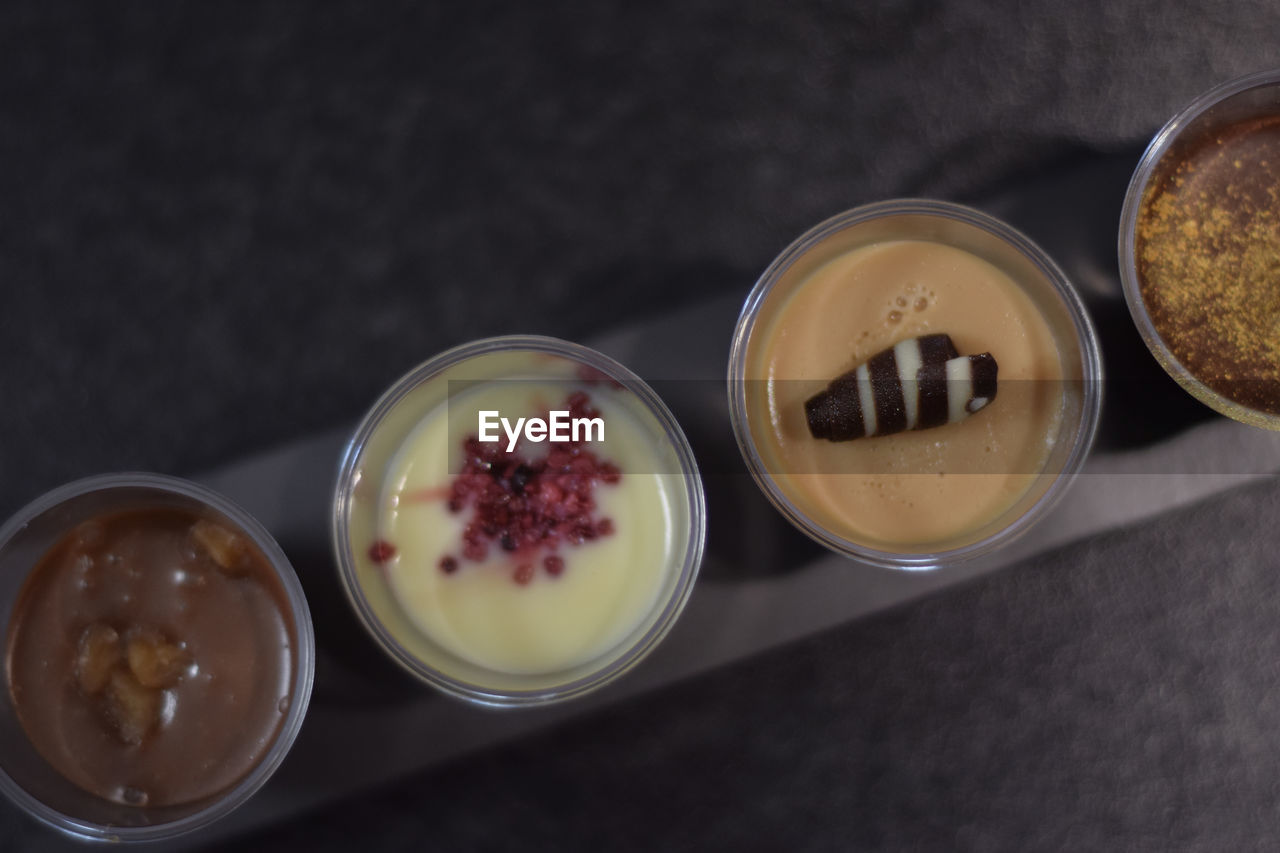 HIGH ANGLE VIEW OF DESSERT IN PLATE ON TABLE