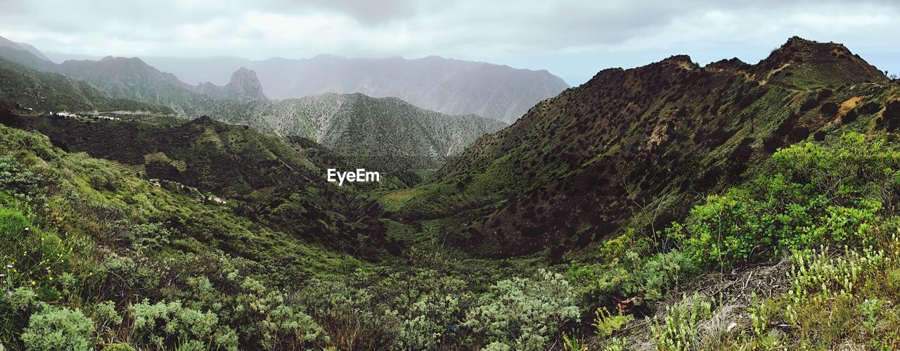 Scenic view of mountains against sky