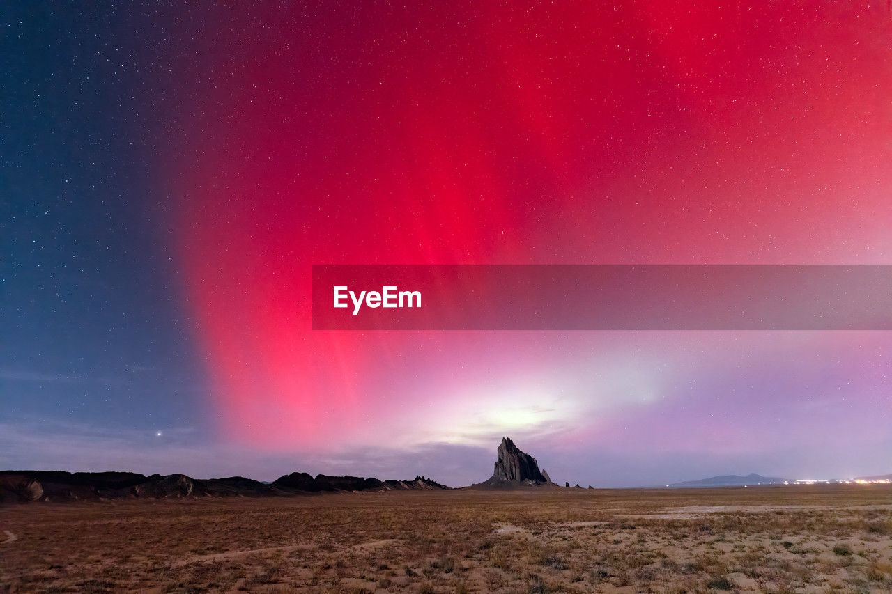 The aurora borealis or northern lights over shiprock, new mexico