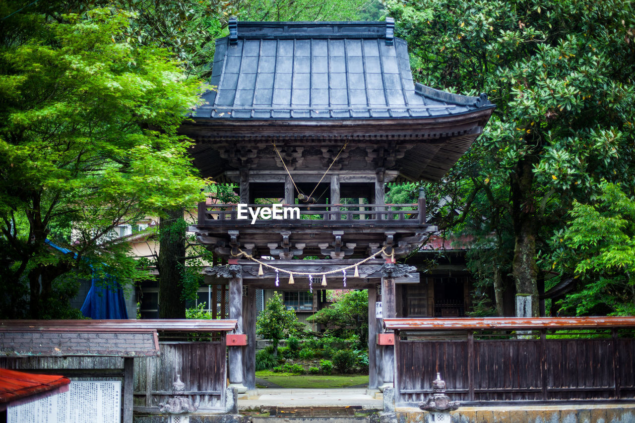 TEMPLE AGAINST BUILDING