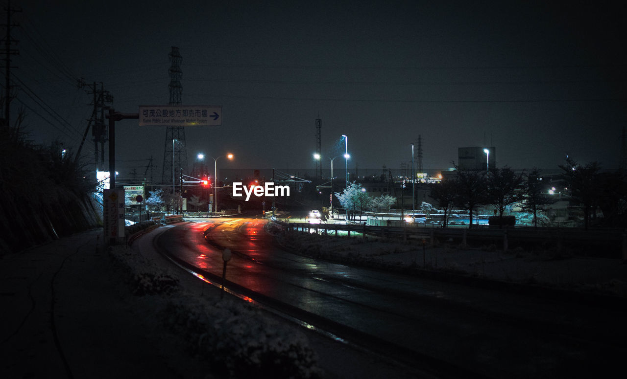 Light trails on road at night