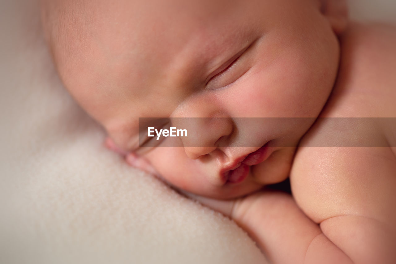 Close up of newborn baby boy sleeping