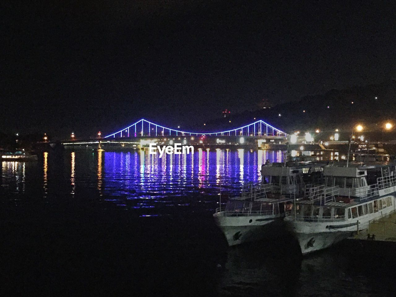 VIEW OF ILLUMINATED BUILDING AT NIGHT