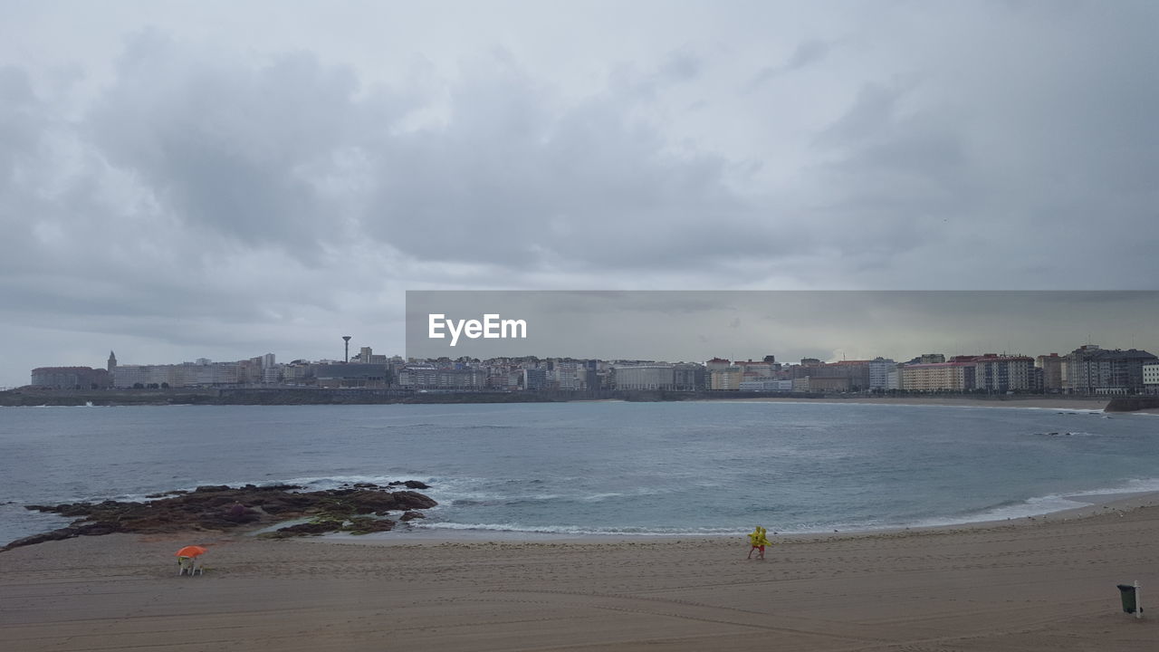 VIEW OF CITYSCAPE WITH WATERFRONT