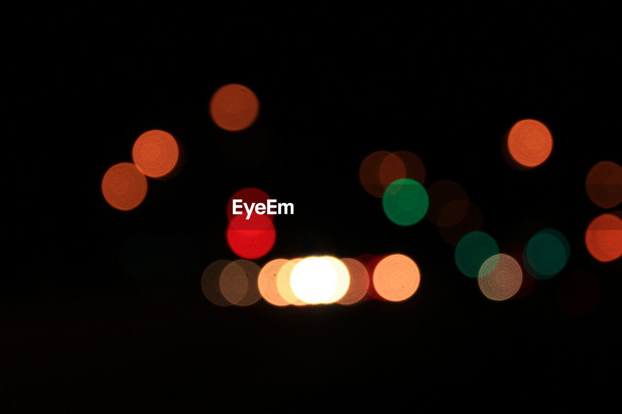 DEFOCUSED IMAGE OF COLORFUL LIGHTS