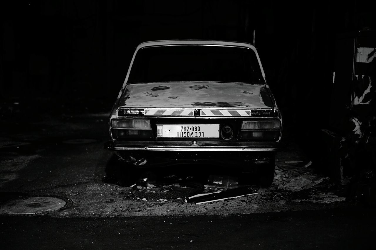 ABANDONED CAR ON NIGHT