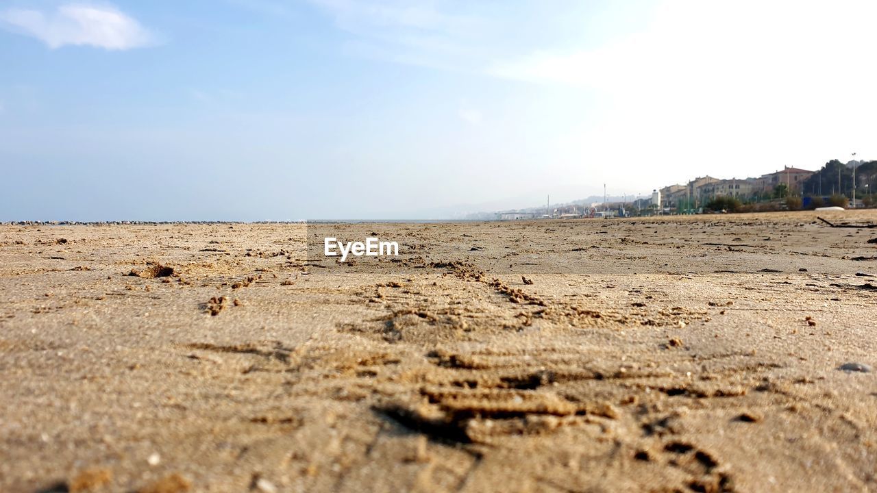 SURFACE LEVEL VIEW OF LAND AGAINST SKY