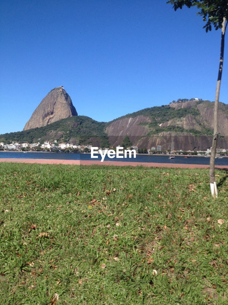 SCENIC VIEW OF MOUNTAINS AGAINST CLEAR BLUE SKY