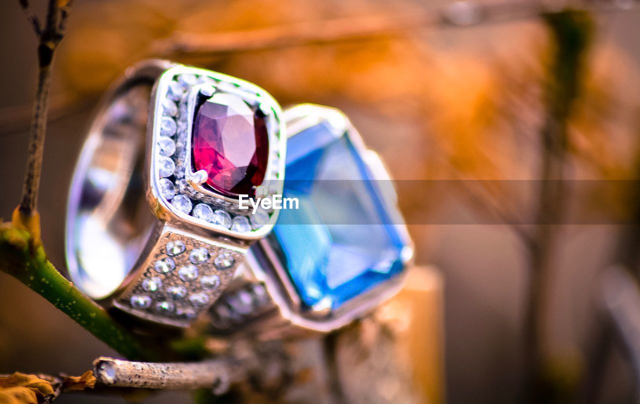 Red rhodolite and london blue topaz rings