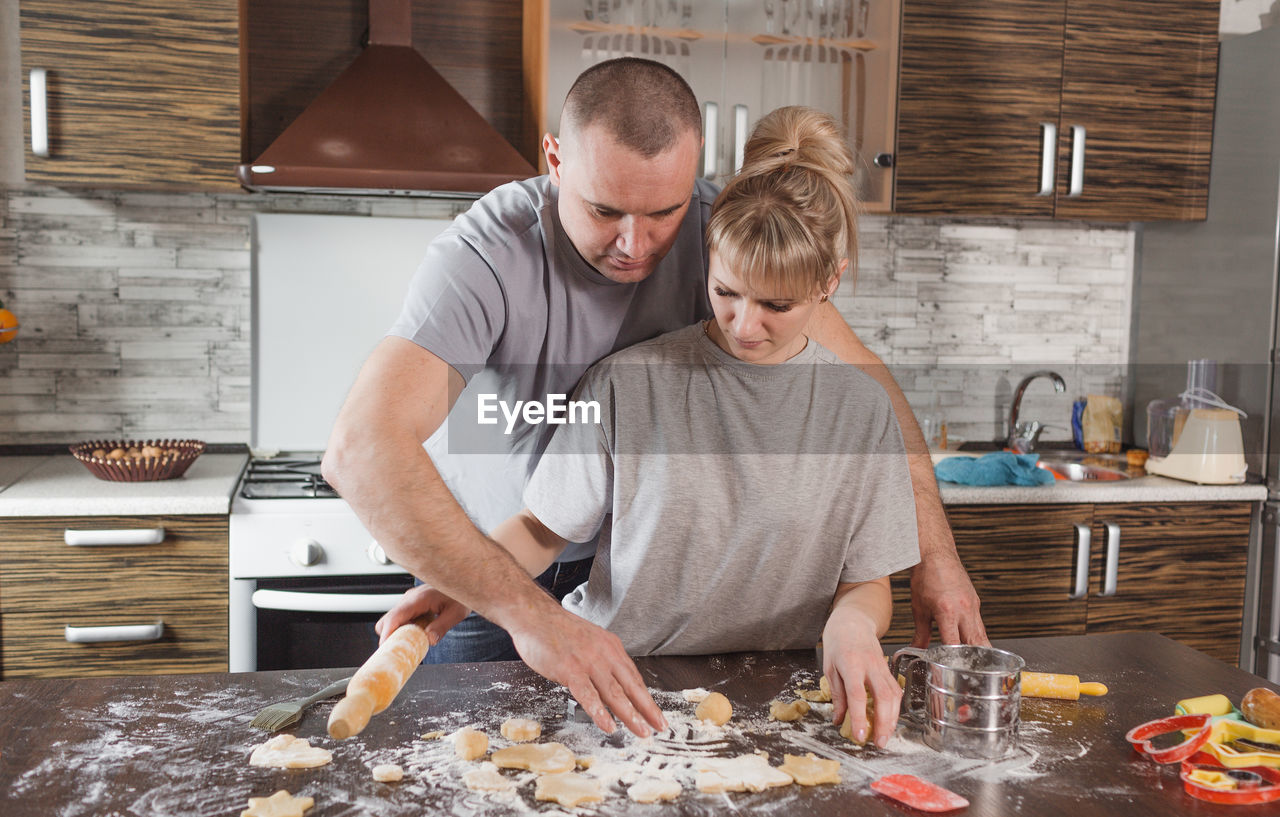 FATHER AND DAUGHTER AT HOME