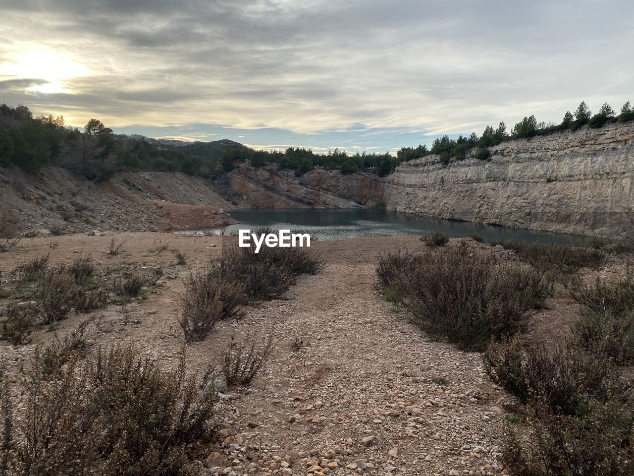 environment, landscape, sky, wilderness, nature, cloud, scenics - nature, land, plant, hill, no people, beauty in nature, tree, natural environment, travel, geology, water, travel destinations, reservoir, river, non-urban scene, tranquility, outdoors, rock, tourism, rural area, desert, tranquil scene, plateau, soil, valley, coast, terrain