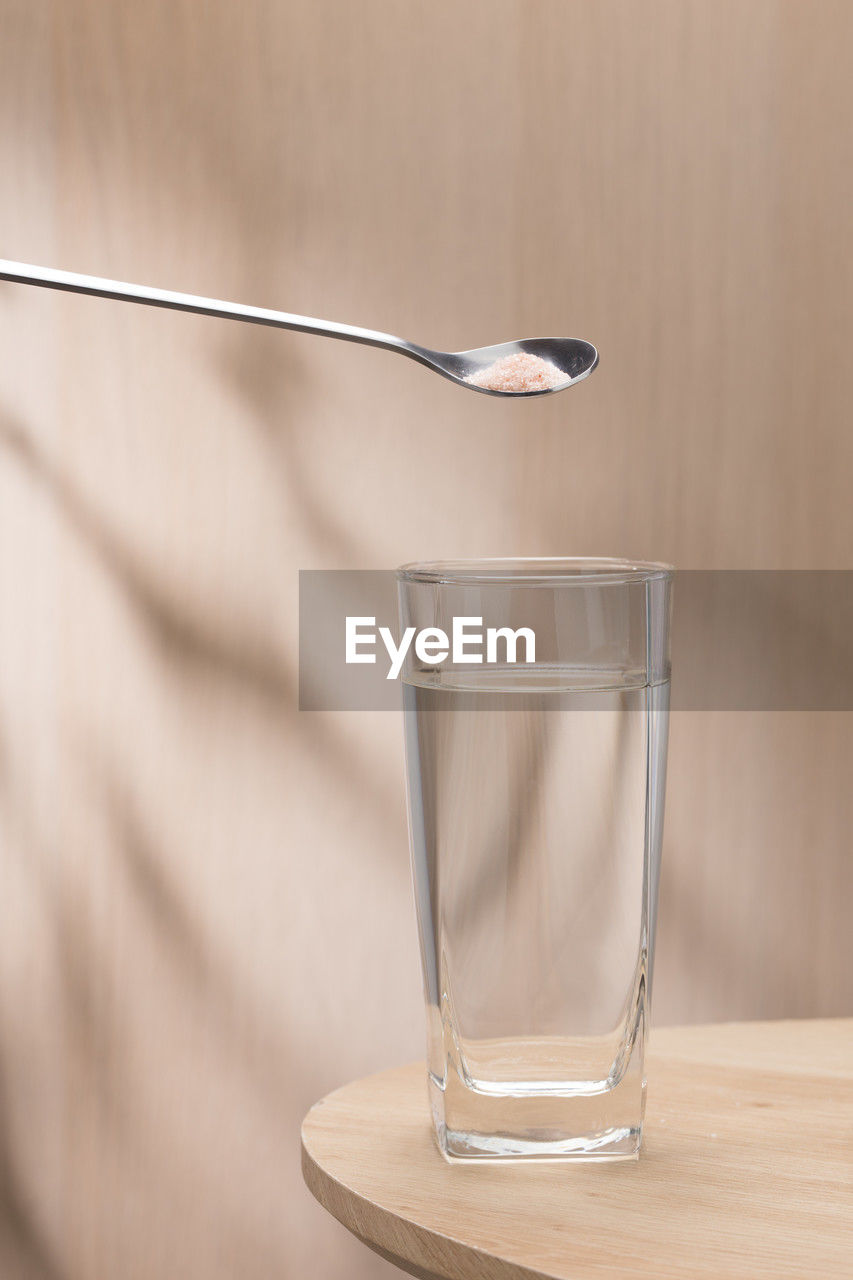 close-up of water in glass against blurred background