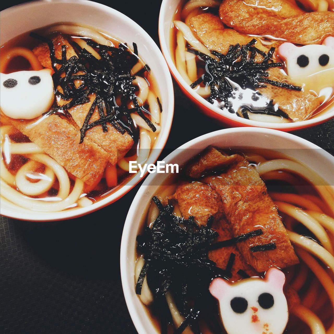 High angle view of udon noodles in bowls on table