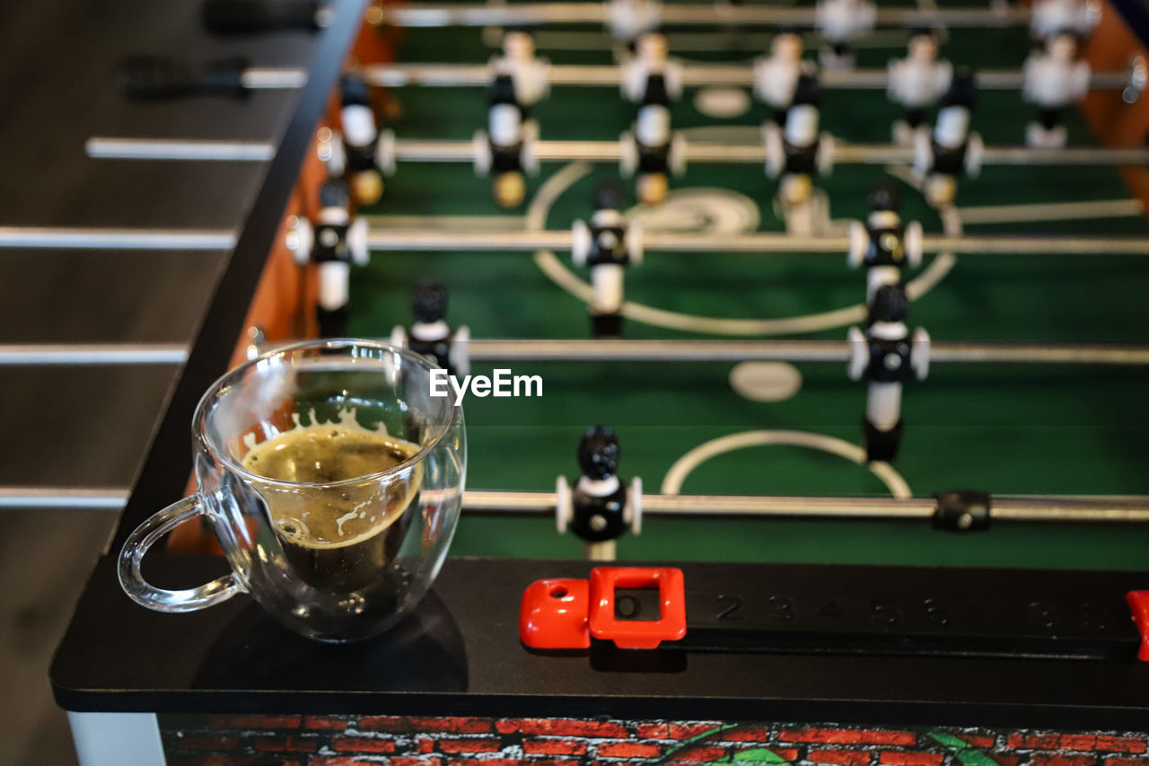 Close-up of coffee glasses on table