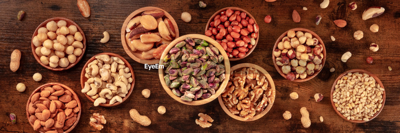 Nut variety panorama, overhead flat lay shot