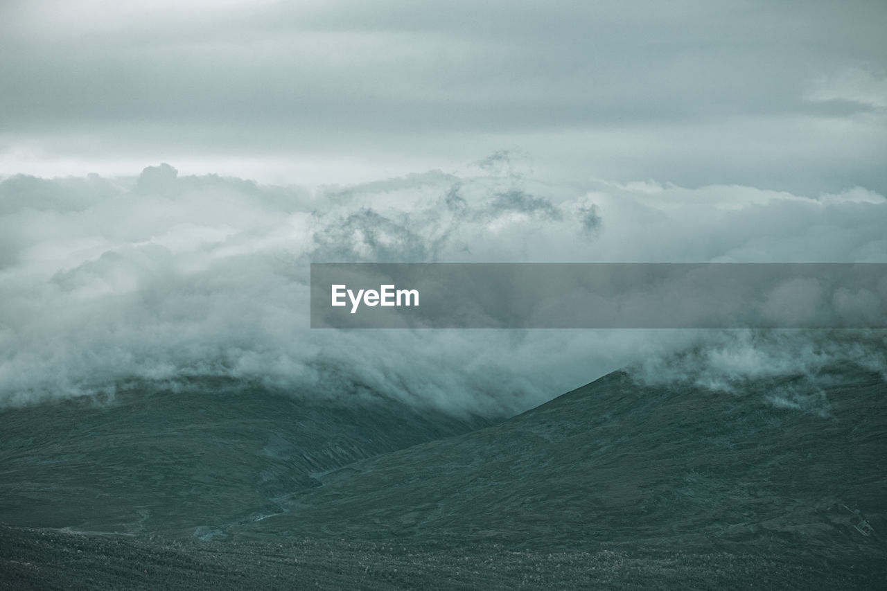 Scenic view of volcanic landscape against sky