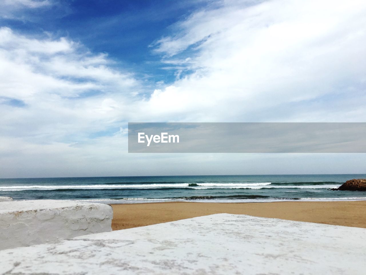 Scenic view of beach against sky