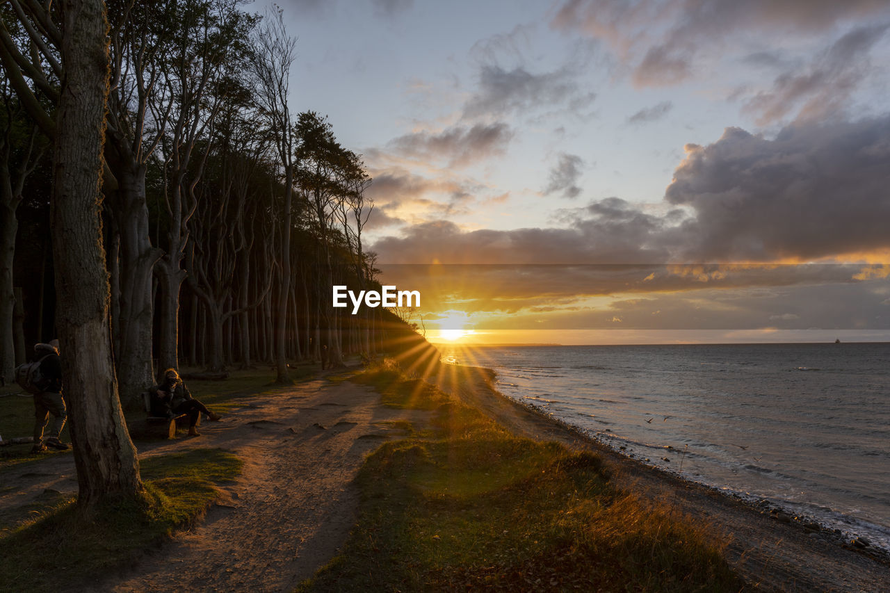 Scenic view of baltic sea against sky during sunset at gespensterwald close to nienhagen.