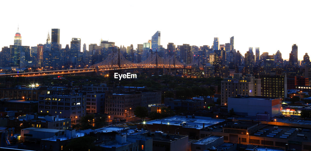 View of illuminated cityscape at dusk