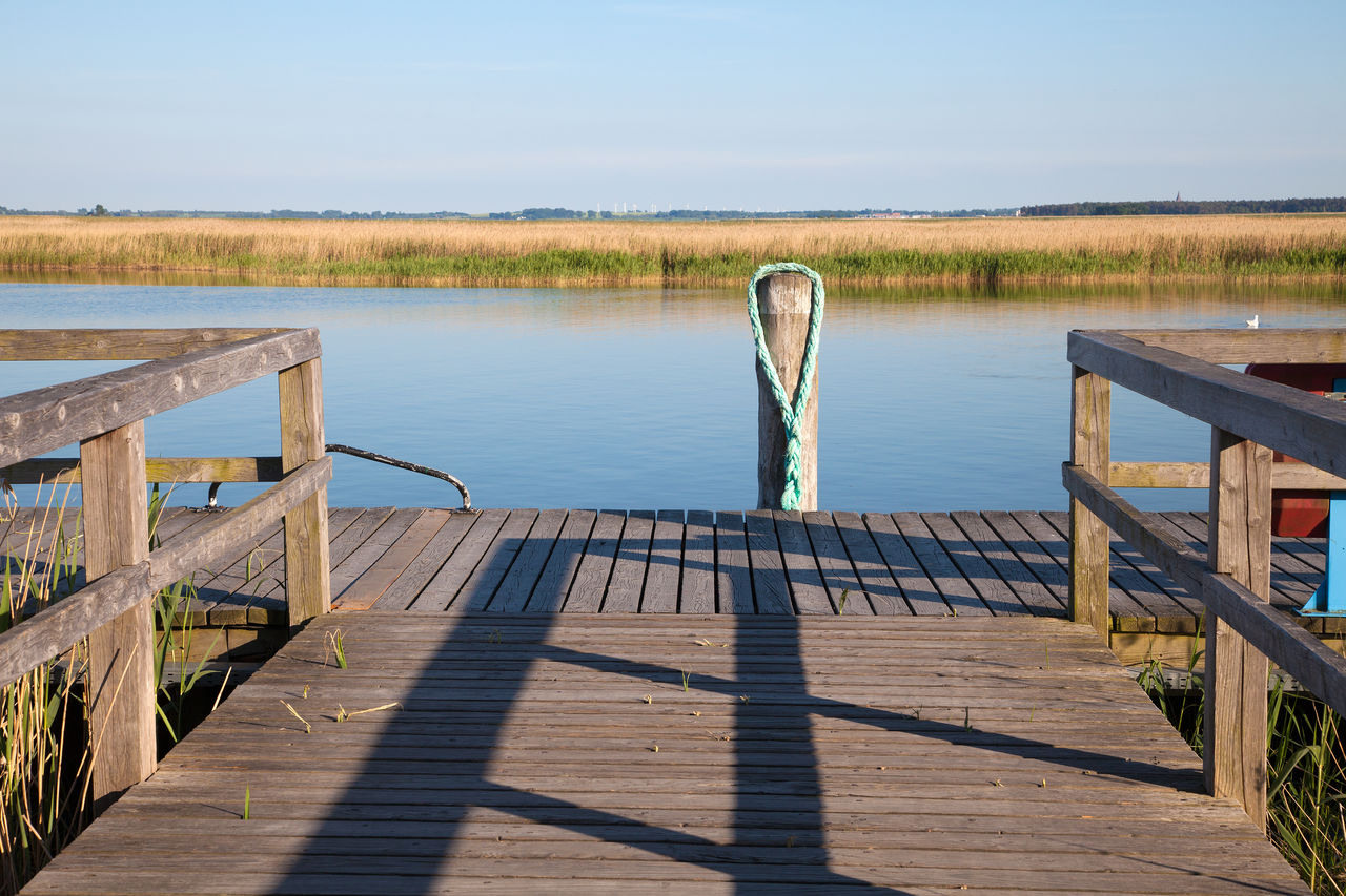 WOODEN PIER ON LAKE