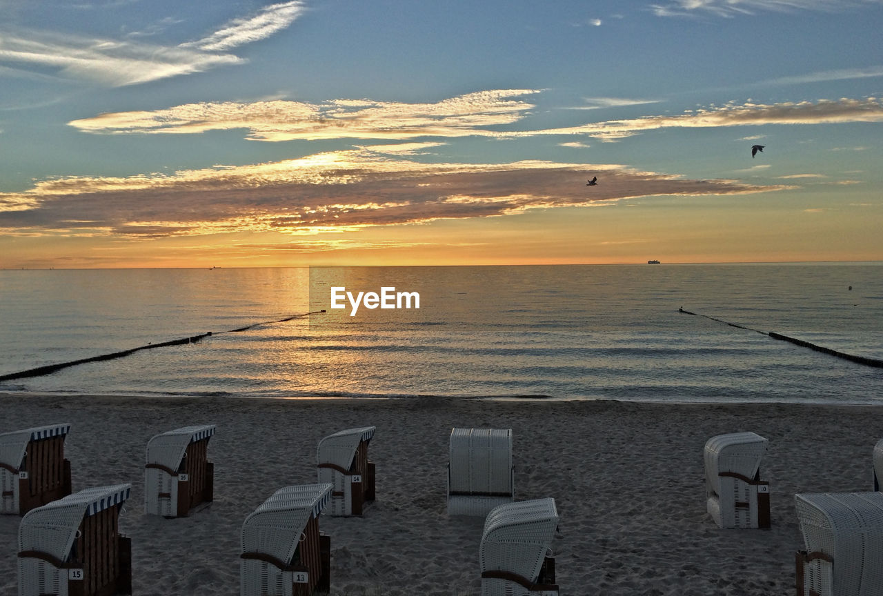 Scenic view of sea at sunset