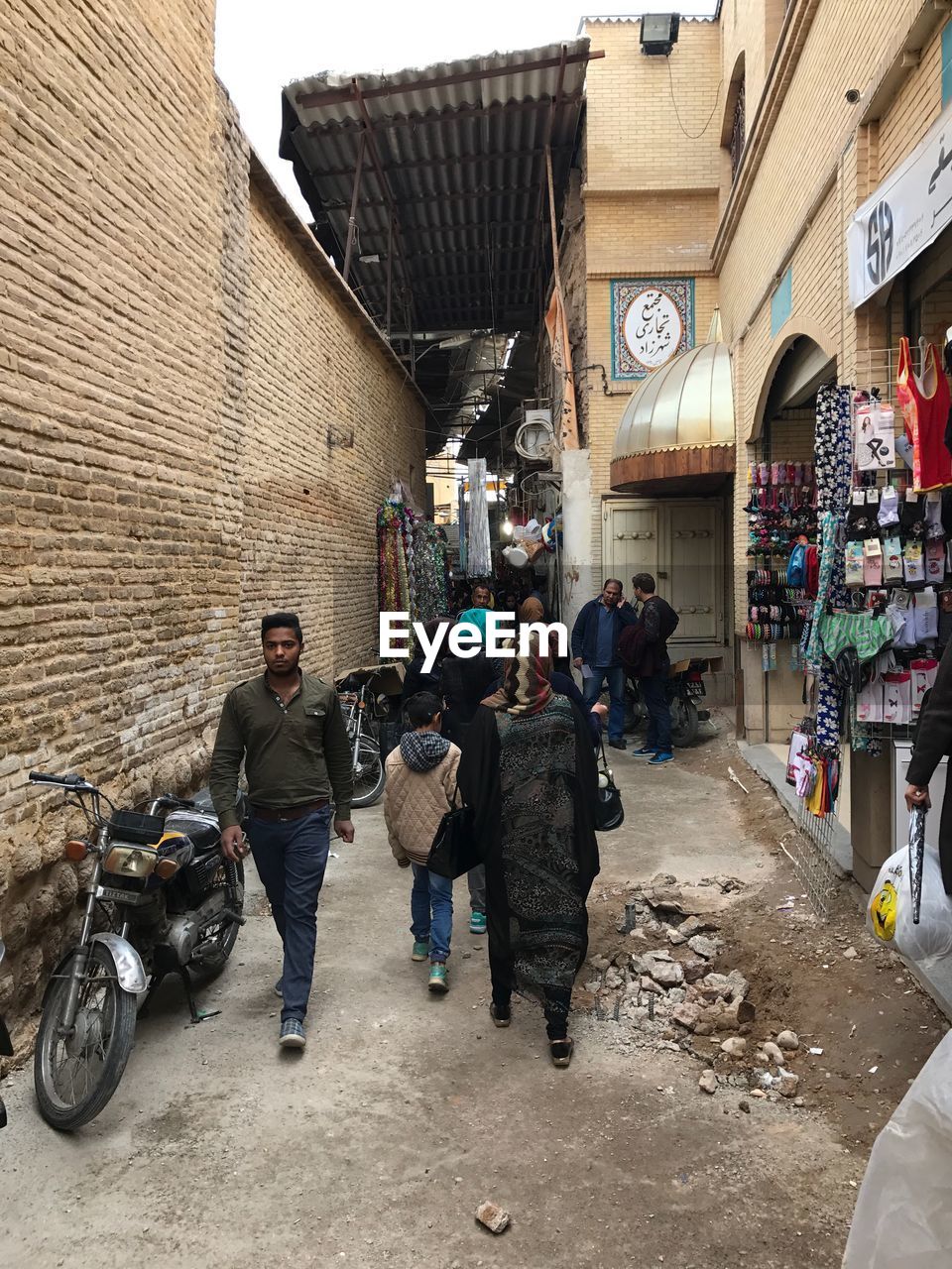 PEOPLE WALKING ON STREET MARKET