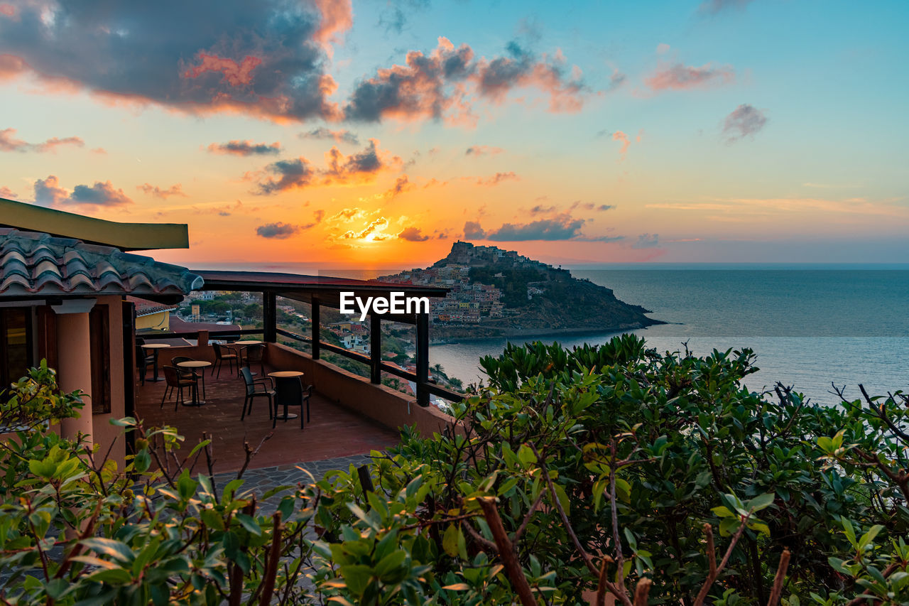 Scenic view of sea against sky during sunset in castelsardo