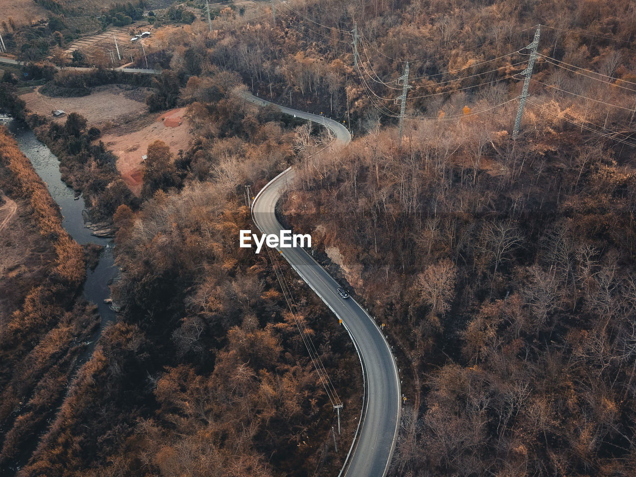 High angle view of winding road on landscape