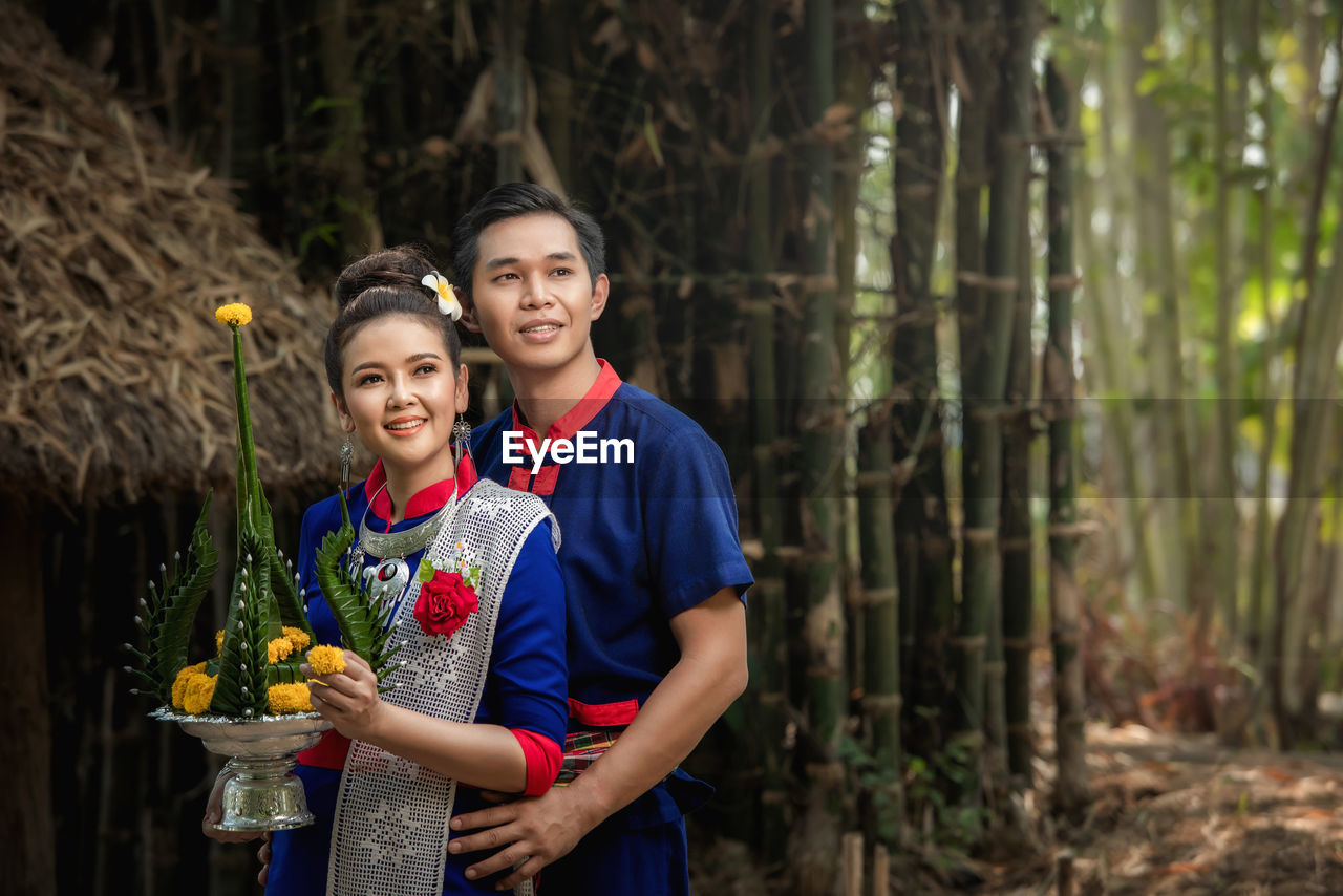Pre wedding shoot inside garden in thai traditional dress costumes