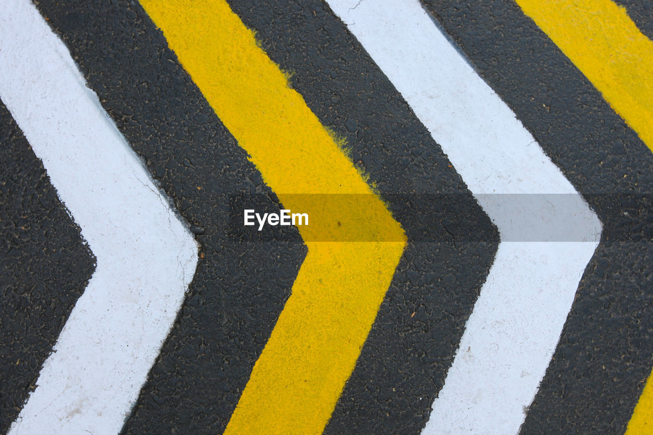 High angle view of road markings on road