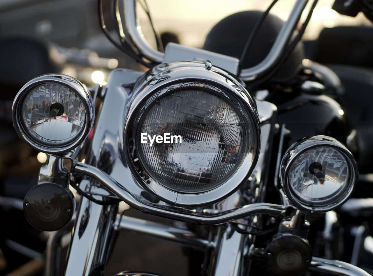 Close-up of motorcycle headlights