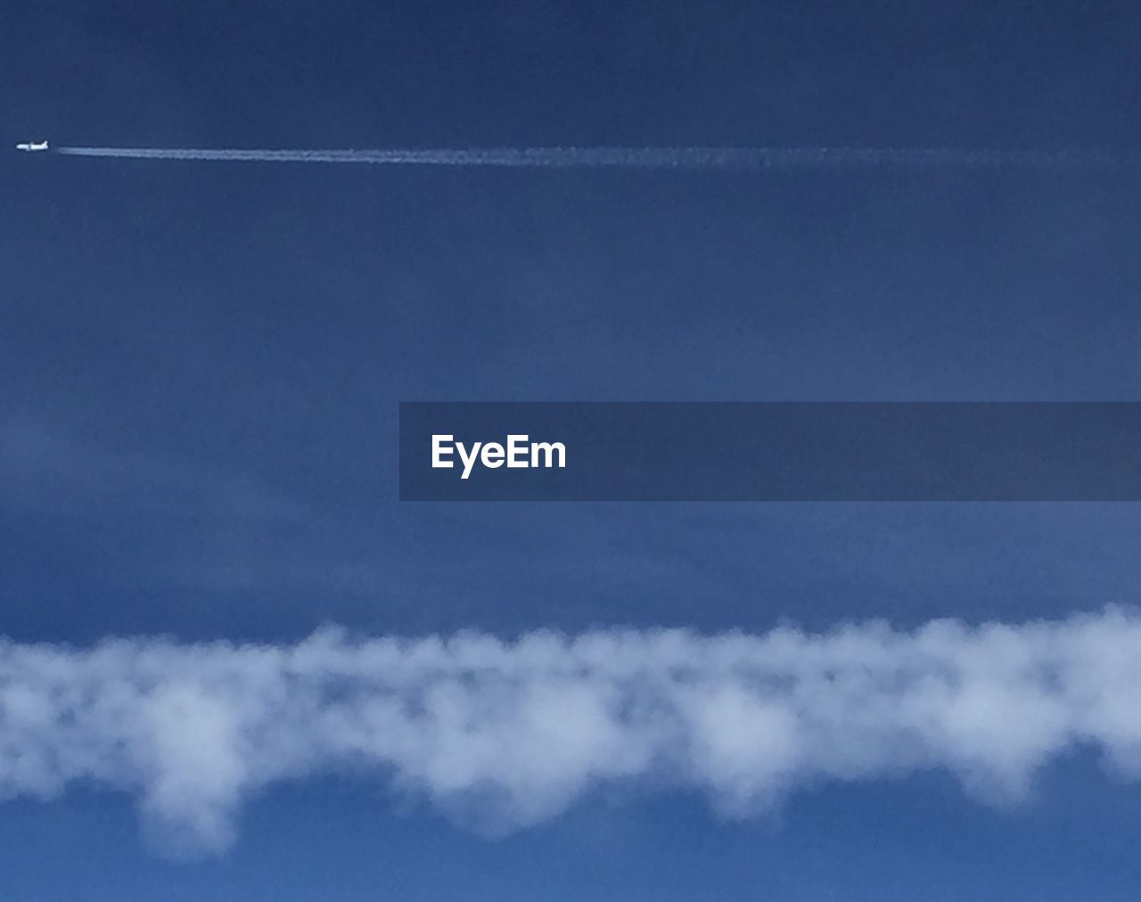 LOW ANGLE VIEW OF CLOUDS IN BLUE SKY