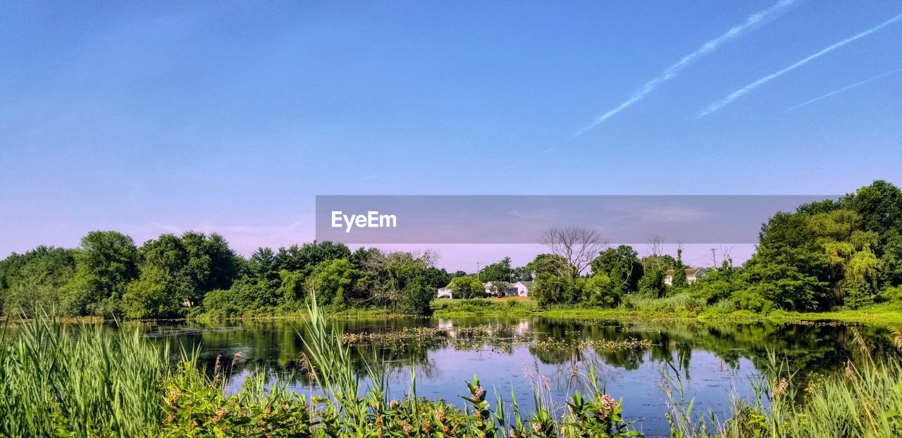 Scenic view of lake against clear sky