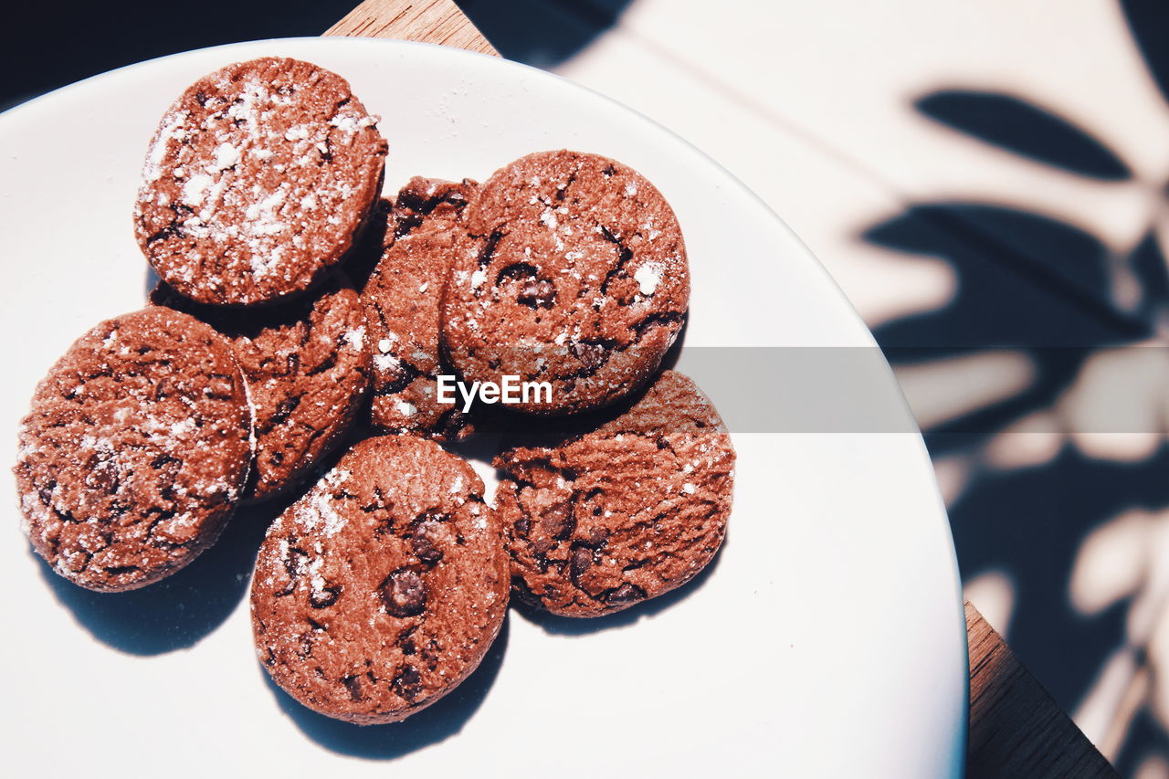 High angle view of cookies in plate on table